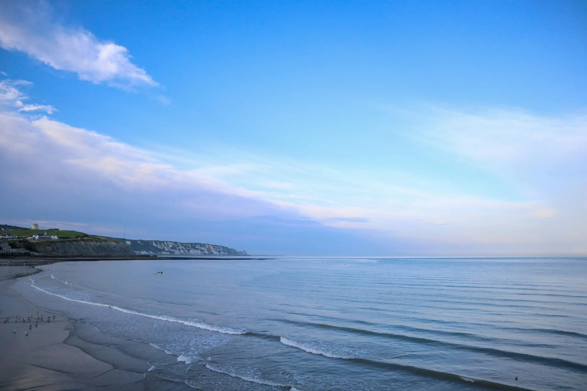 Tranquil sea and sky at Folkestone's coastline, perfect for serene landscapes.